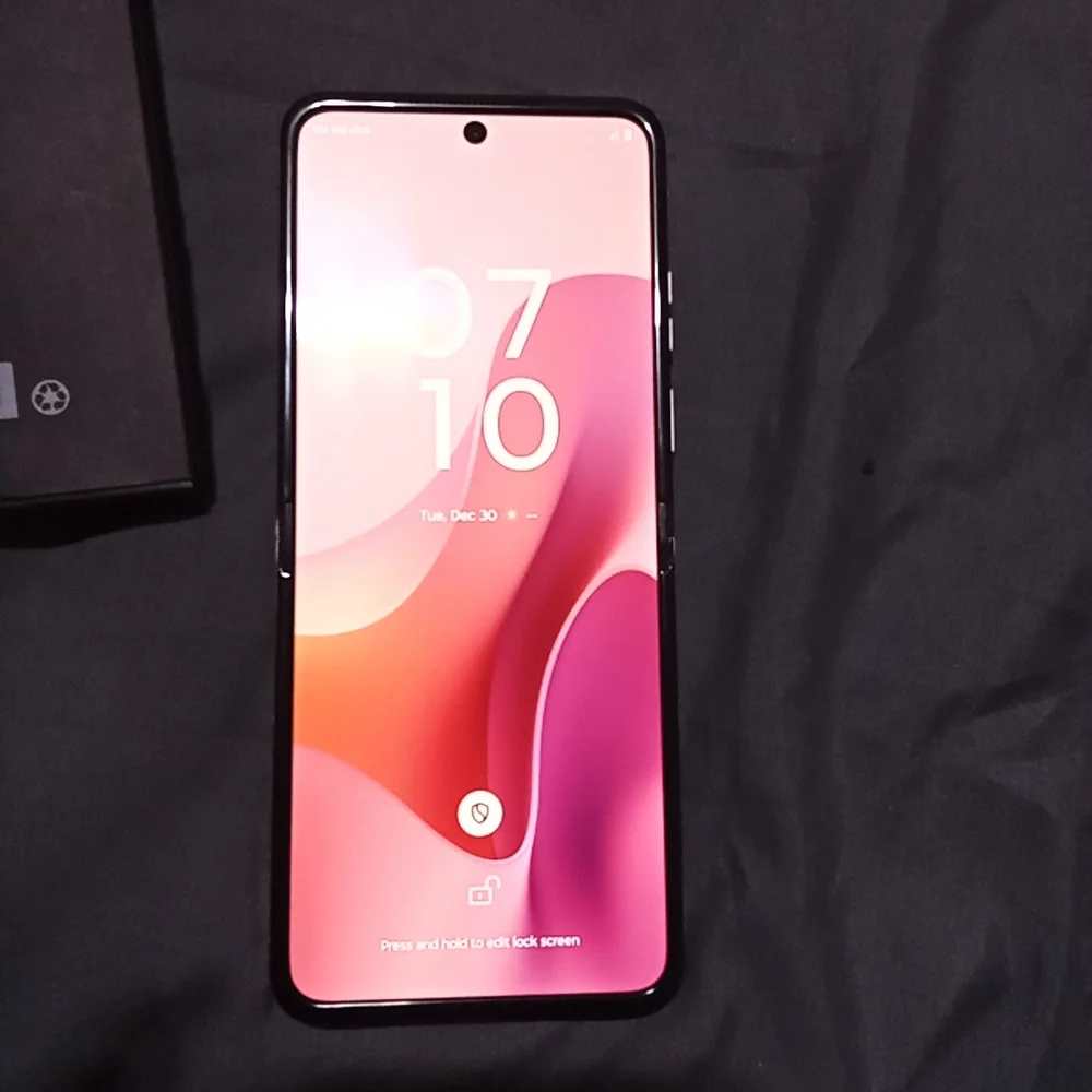 Motorola Smartphone with Blue and Purple Accents Come With A Purple Phone Case